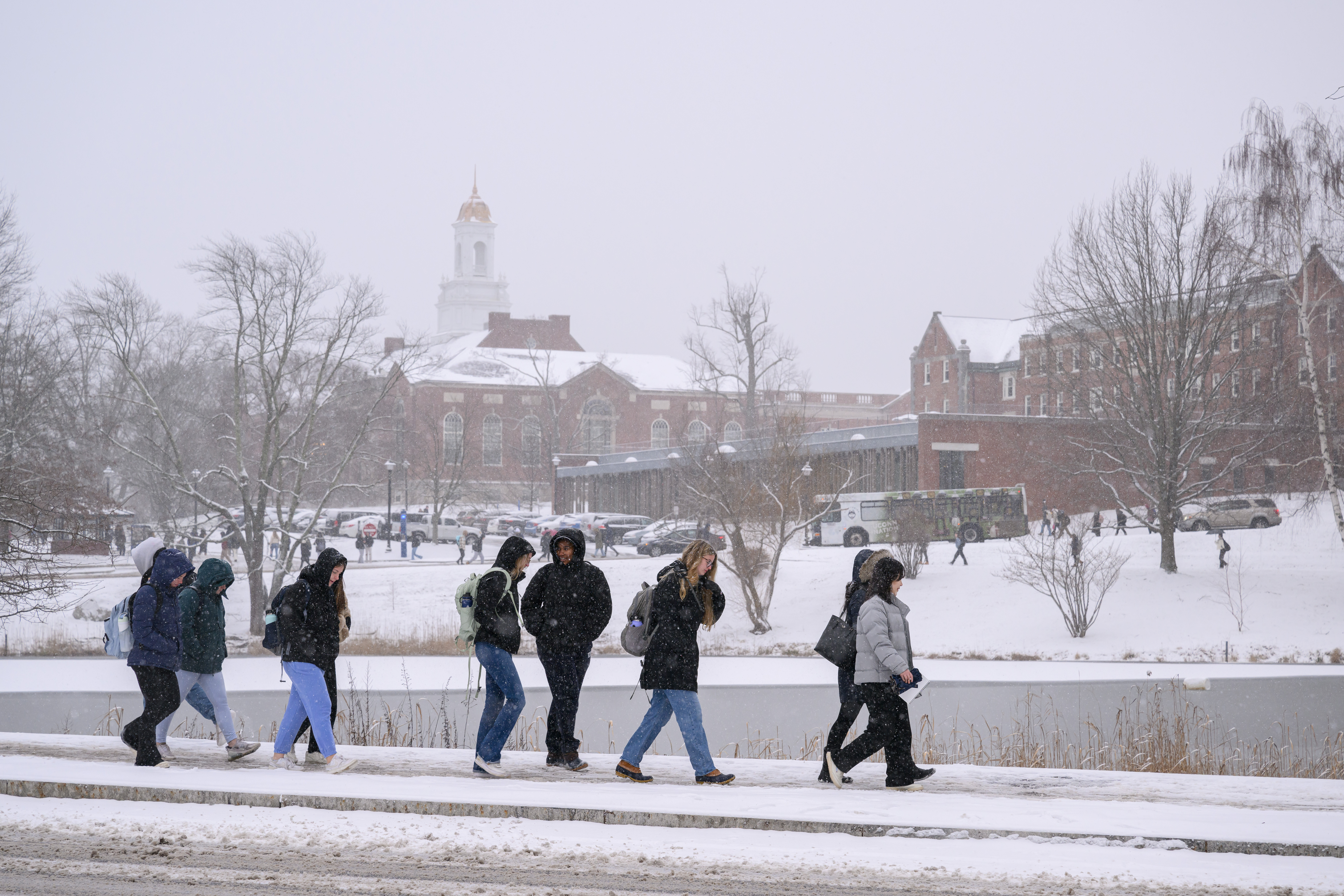 students walking in the snow